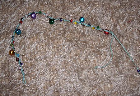 Pulseira guizos - ver detalhe